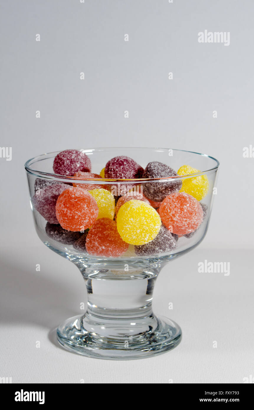 A Studio Photograph of American Hard Gum Sweets in a Clear Stemmed Bowl Stock Photo