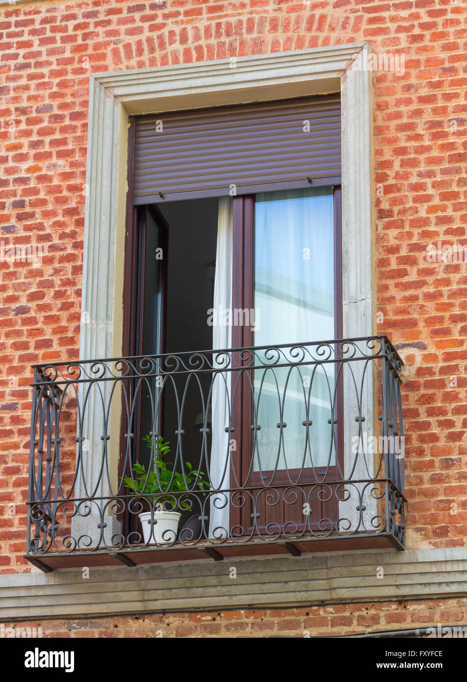 Windows Railing Front window railing brick facade Stock Photo - Alamy