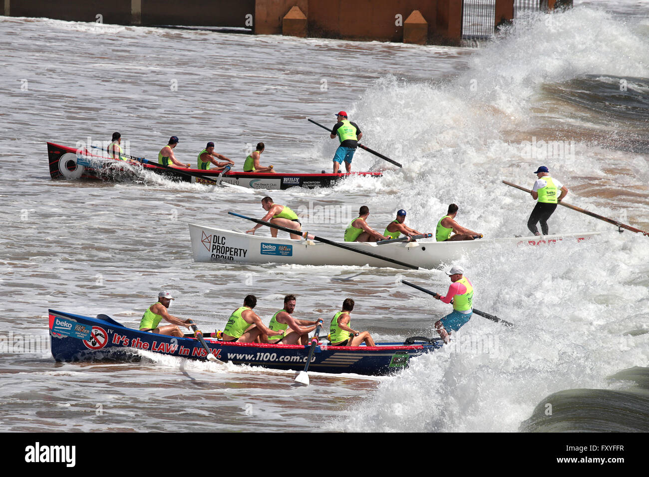 Surf lifesavers competing in the Ocean Thunder surf boat rowing series