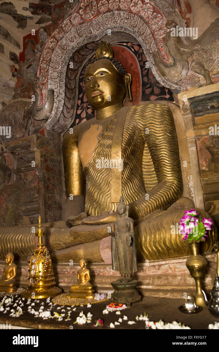 Sri Lanka, Kandy, Pilimathalawa, Gadladeniya Temple, ancient golden Buddha figure in Dhyana mudra meditation pose Stock Photo