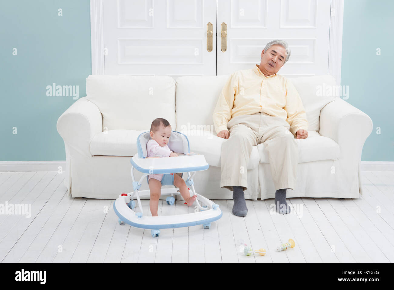 Senior man sitting on couch hi-res stock photography and images - Alamy