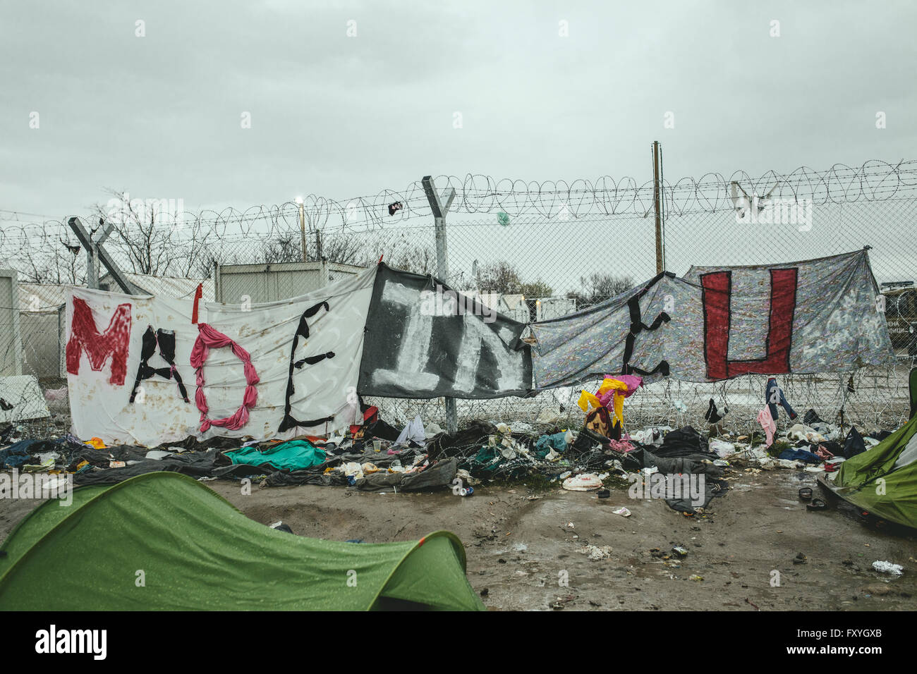 Transparent on the border fence Made in EU, refugee camp in Idomeni, border with Macedonia, Greece Stock Photo