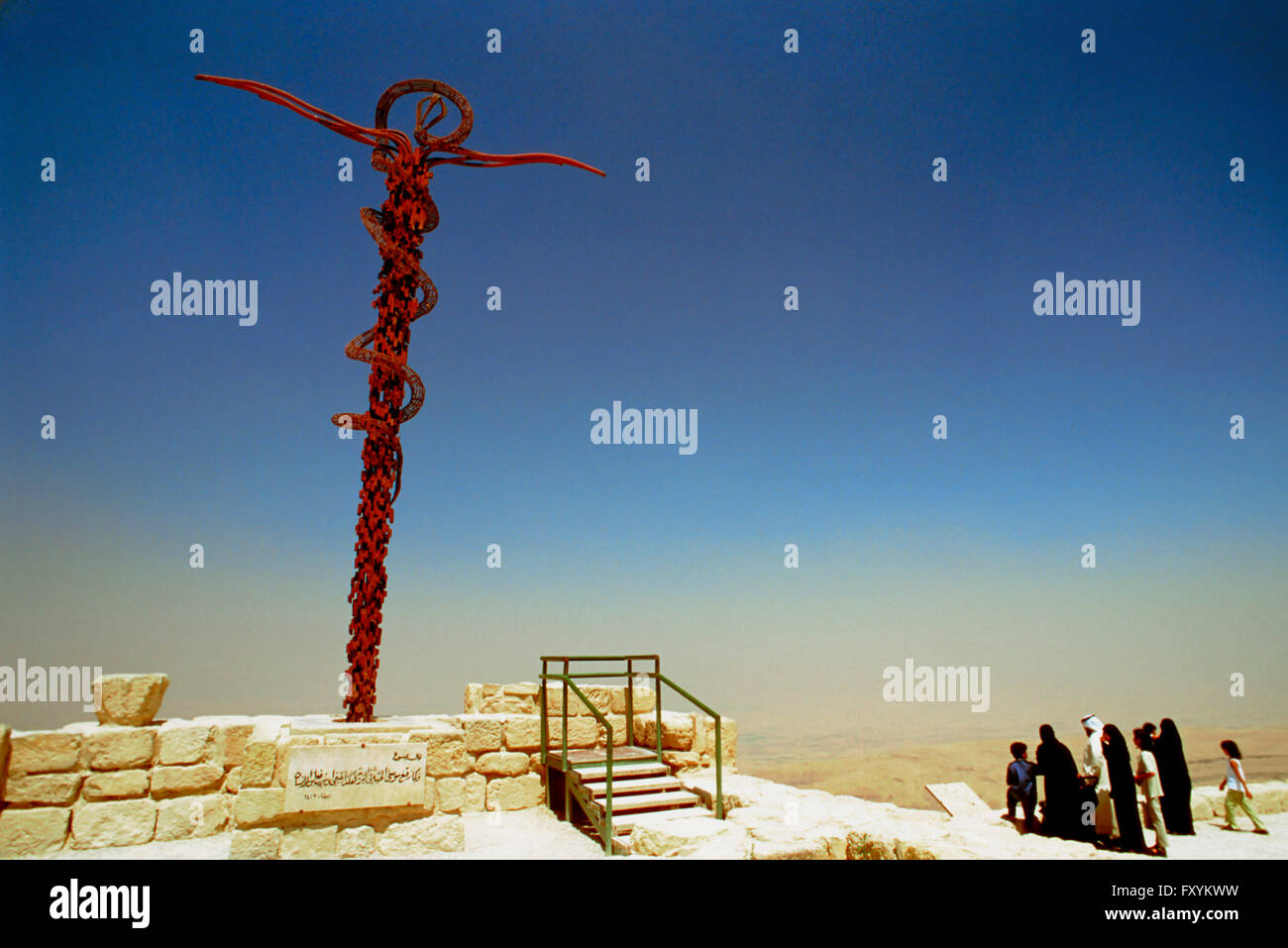 Serpentine Cross or Brazen Serpent Monument at the Moses Memorial Church, Mt Nebo, overlooking Jordan valley and Jericho oasis, Stock Photo