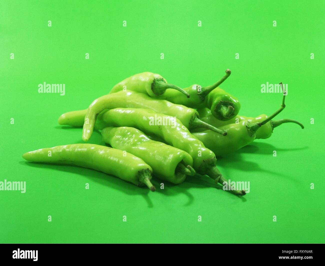 green chili peppers Stock Photo - Alamy