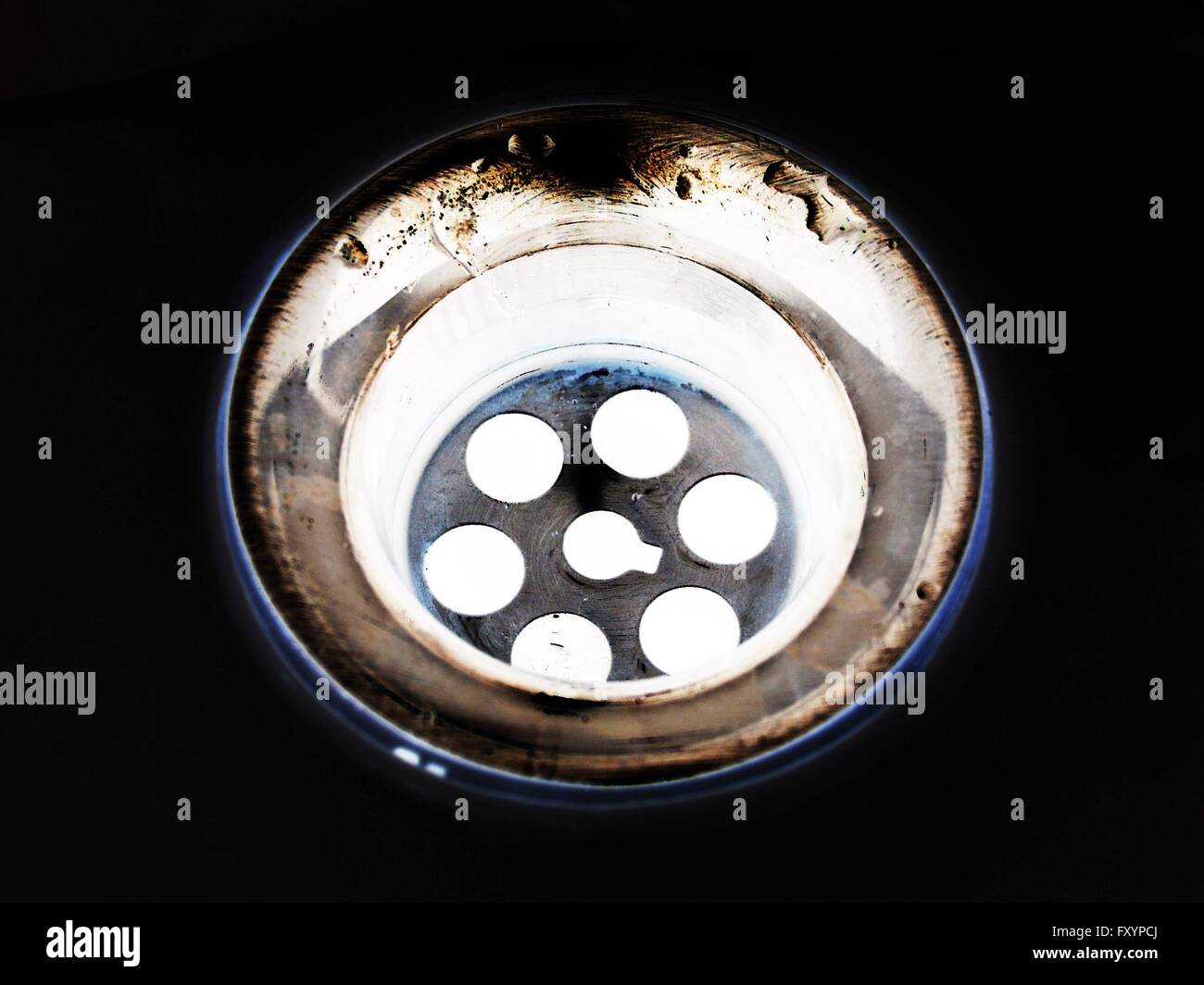 Stainless steel sink plug hole Stock Photo Alamy