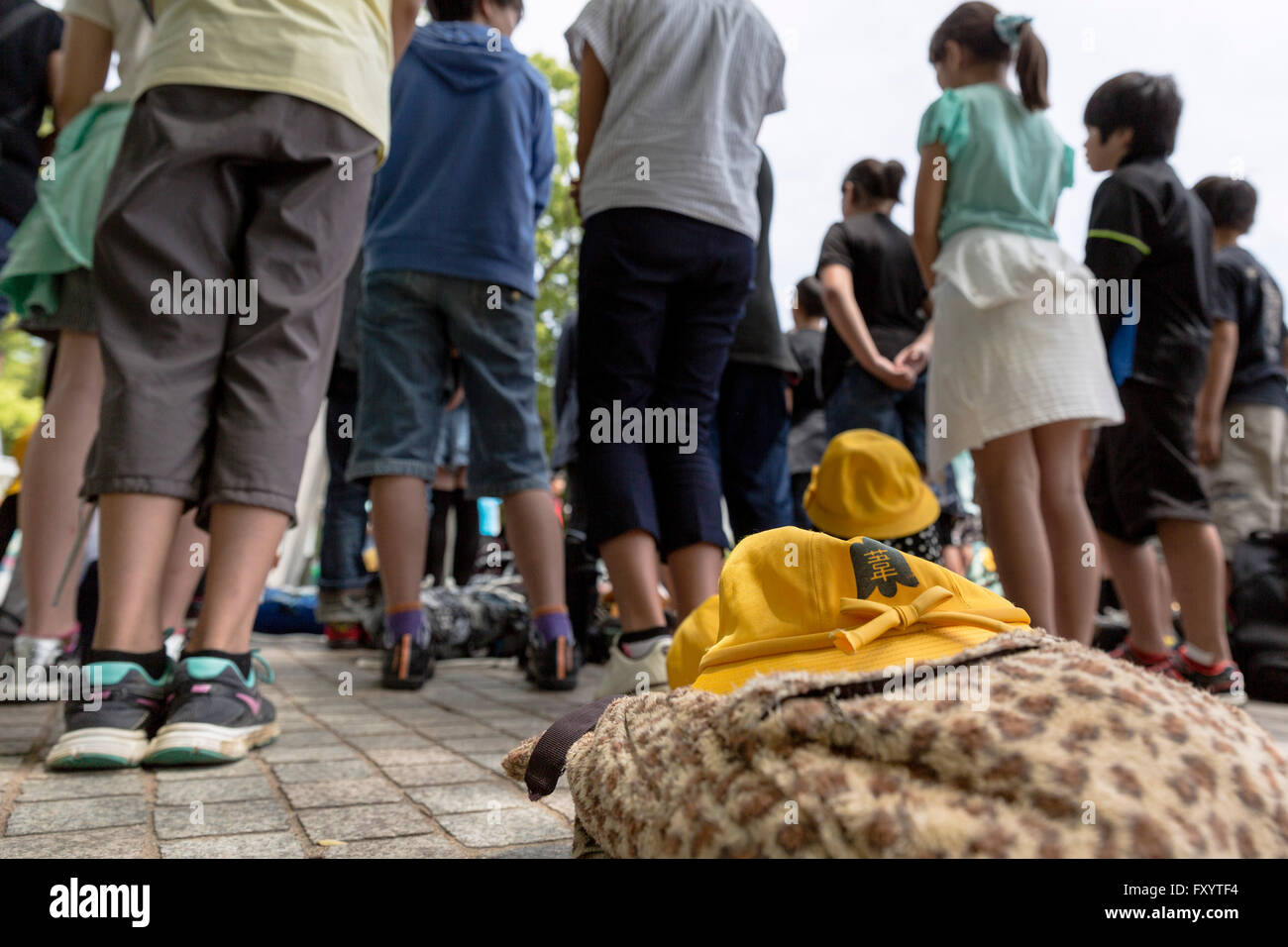 Students gathering at the Children's Peace Monument to honour the memory of atomic bombing victims. Stock Photo