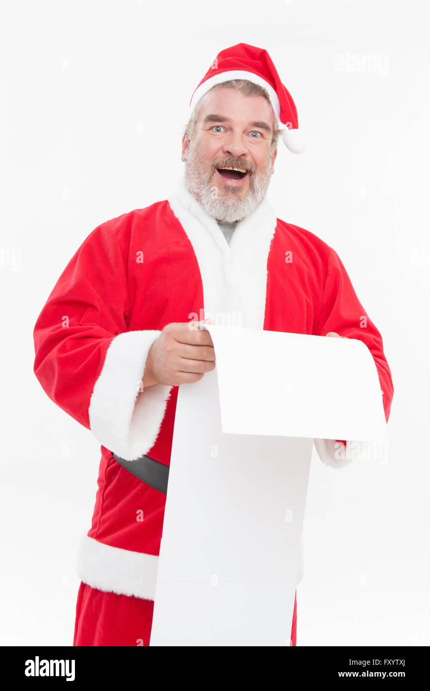 Smiling Santa Claus in his late forties holding a letter staring at front Stock Photo