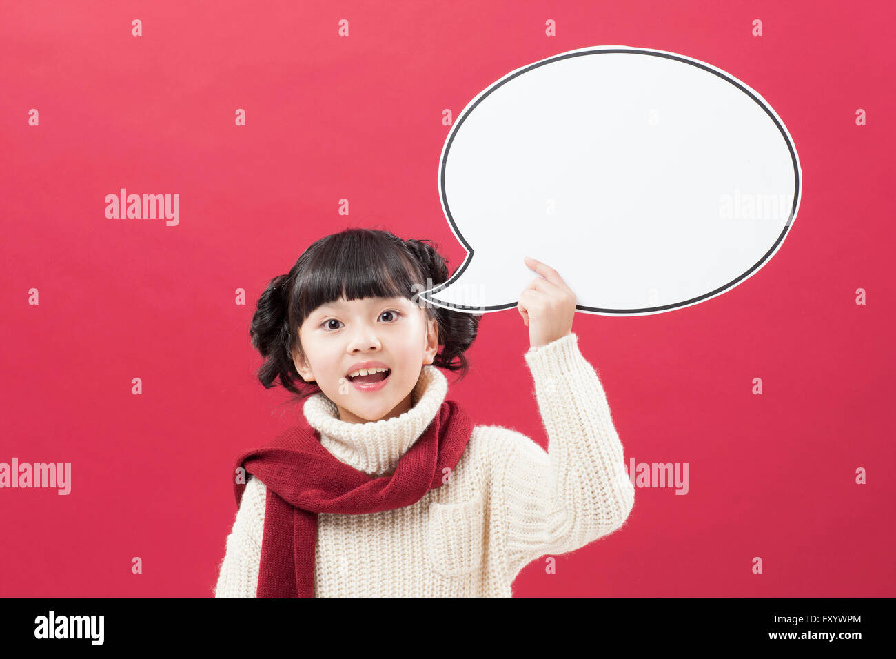 Portrait of smiling girl with a speech balloon staring at front Stock Photo