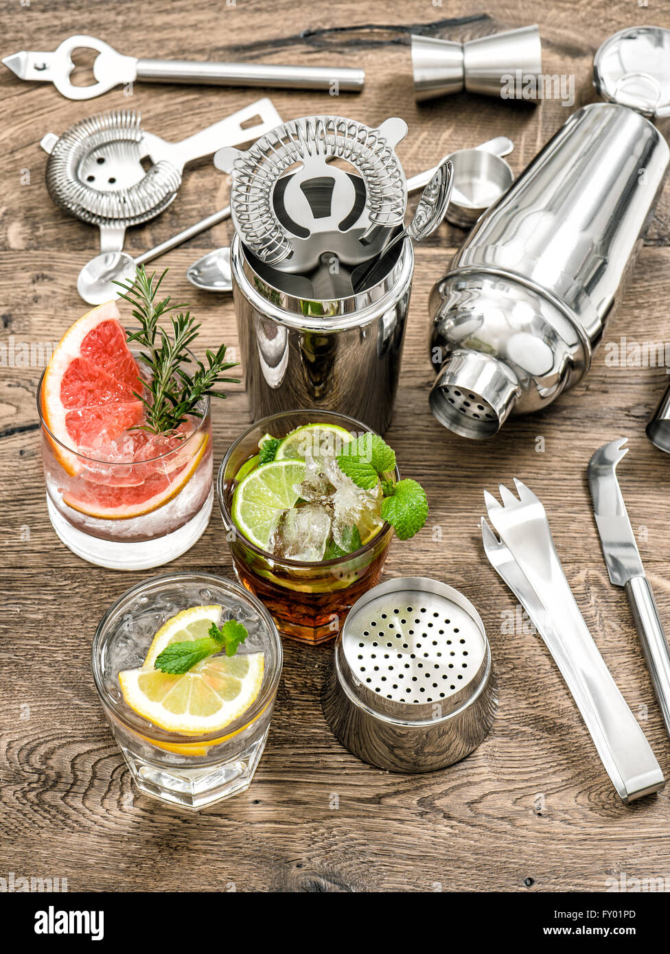 Cocktails with fruits and ice. Bar drink making tools Stock Photo
