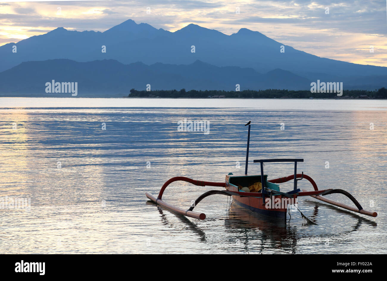 Fisherman in the morning near Rinjani volcano, lombok, indonesia Stock Photo