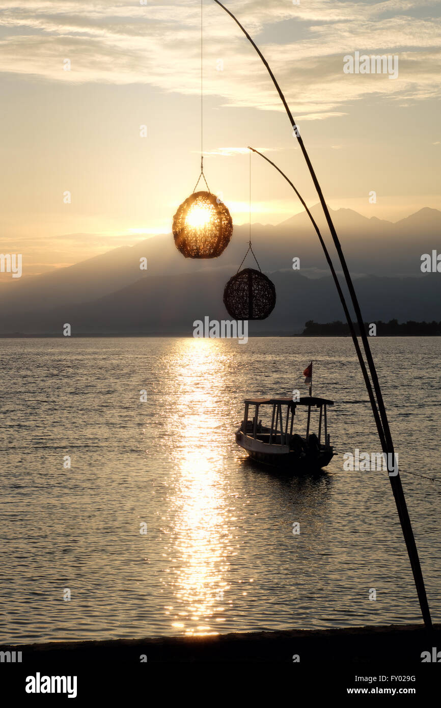 Boat at dawn. Lombok view from Gili Meno; Stock Photo