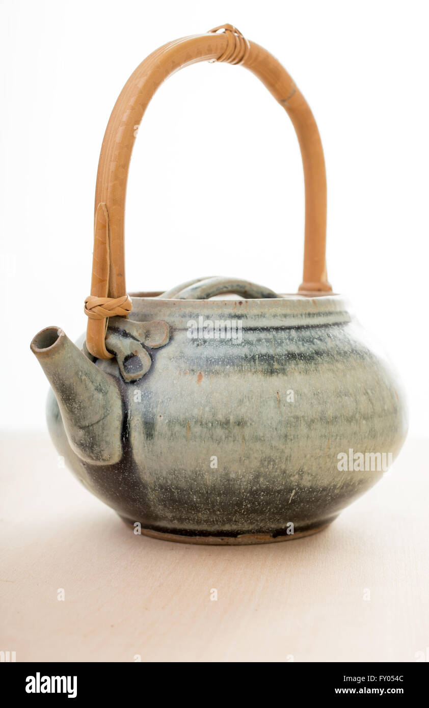 An Asian clay teapot with bamboo handle Stock Photo Alamy