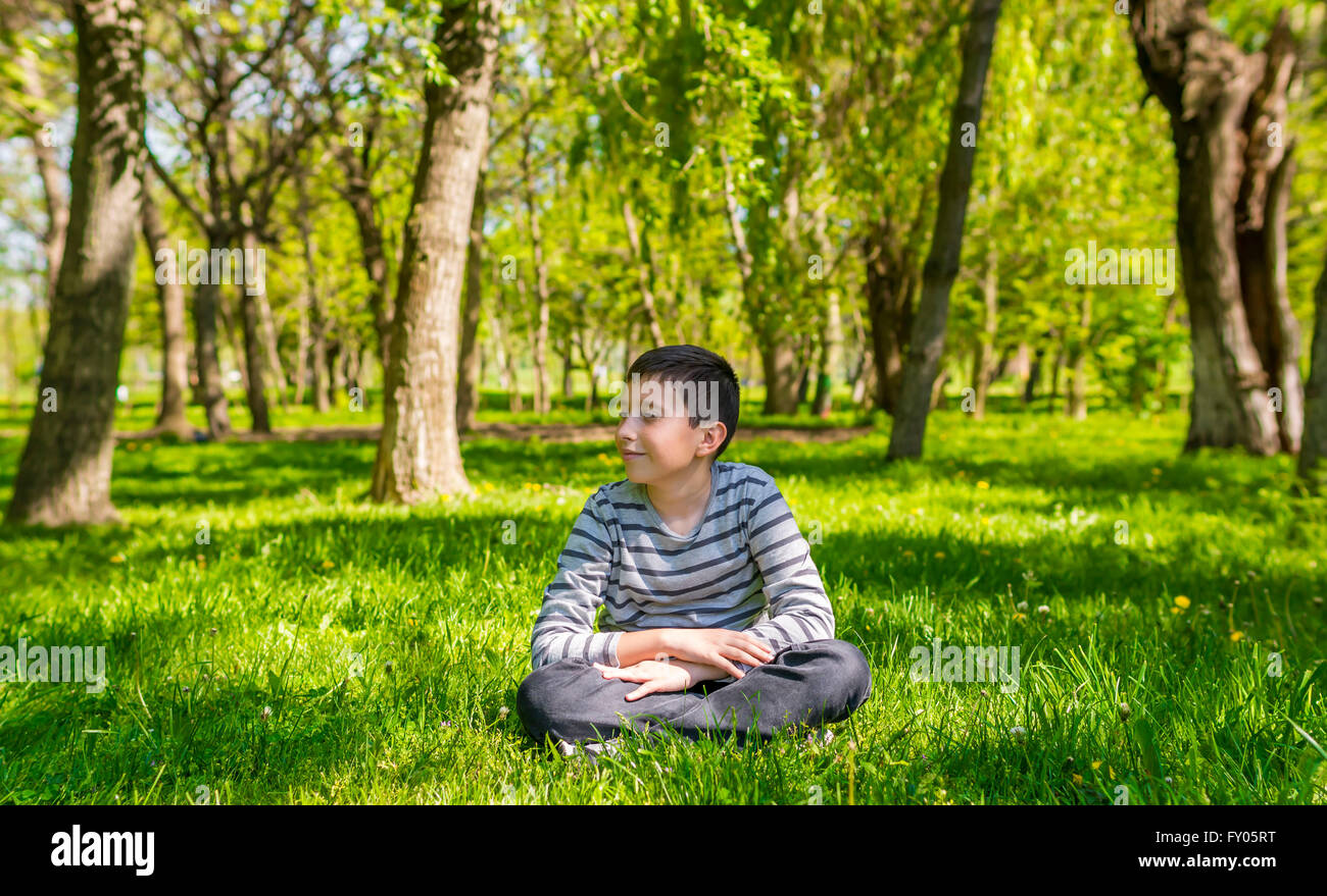 Young boy in the green nature Stock Photo Alamy