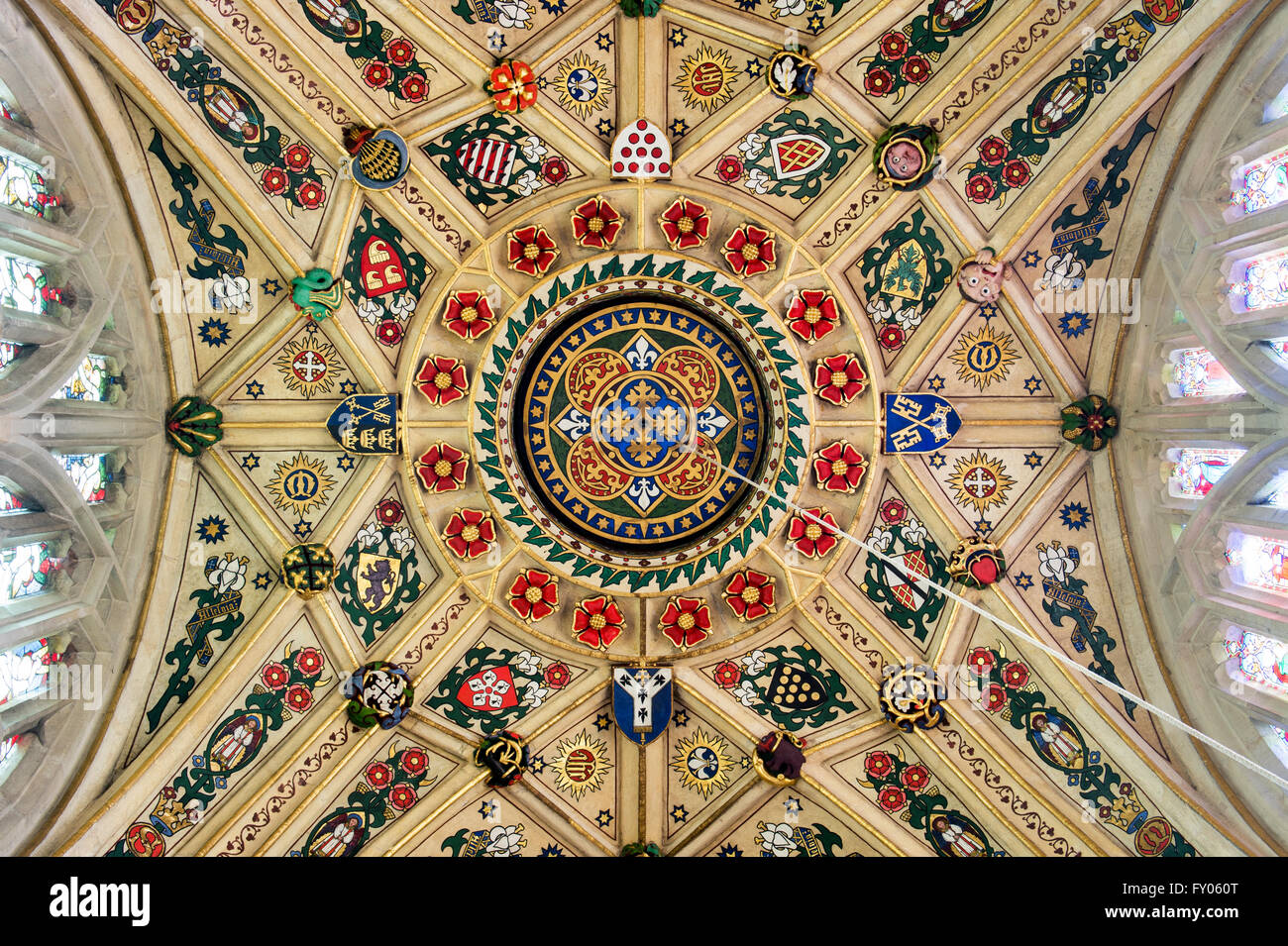 Decorative painted tower ceiling with heraldic shields in St Marys church, Kempsford, Gloucestershire. England Stock Photo