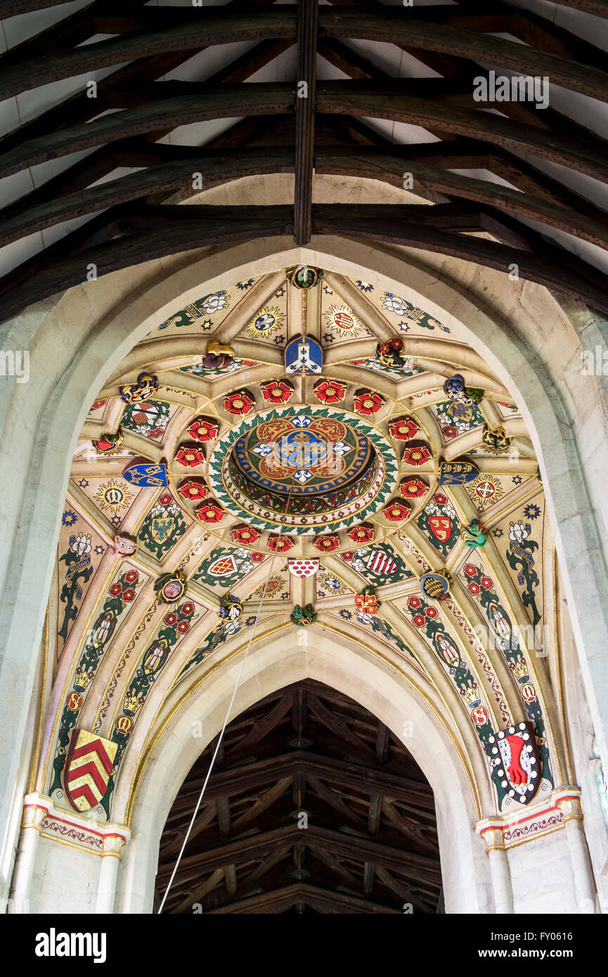 Decorative painted tower ceiling with heraldic shields in St Marys church, Kempsford, Gloucestershire. England Stock Photo