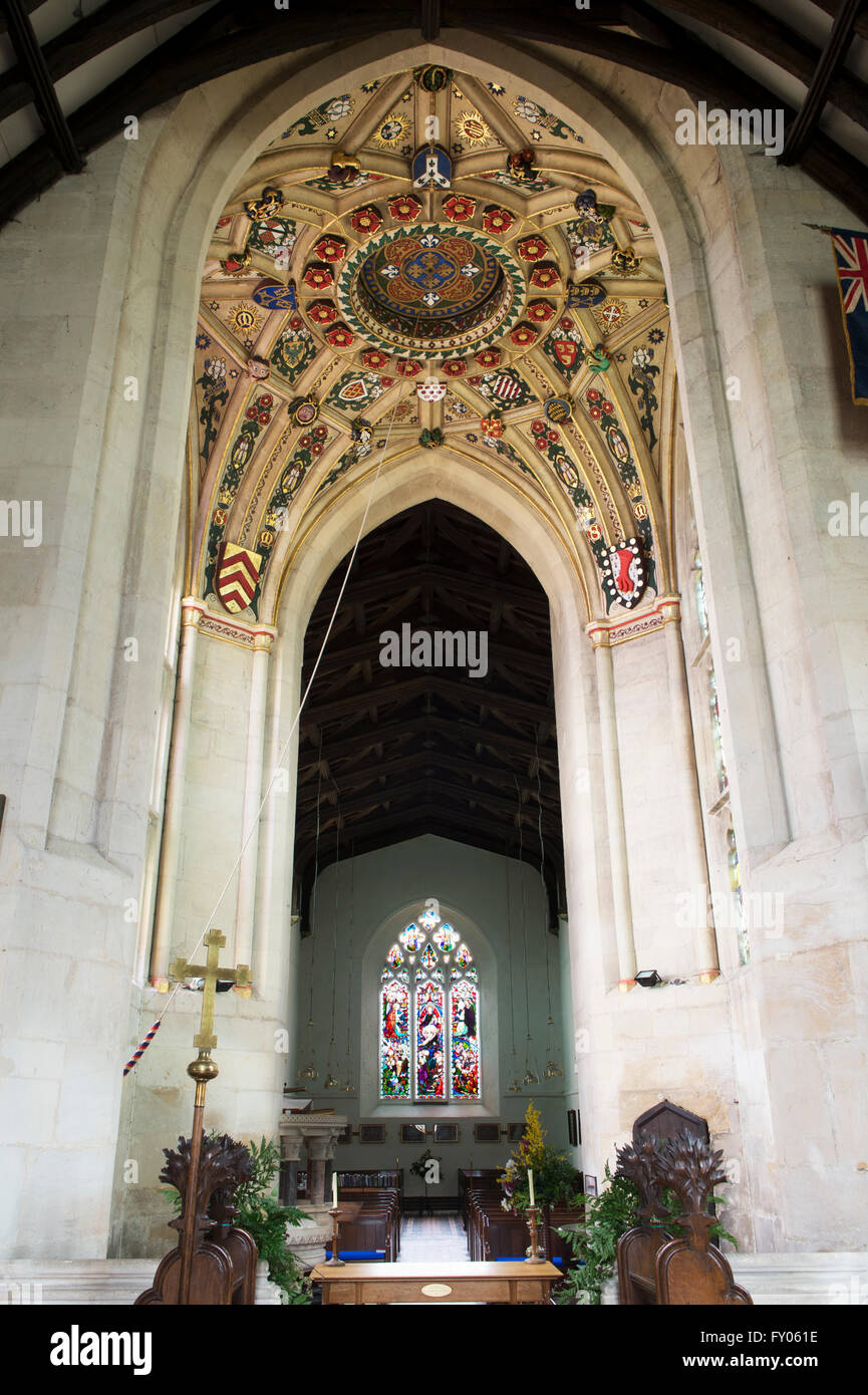 Decorative painted tower ceiling with heraldic shields in St Marys church, Kempsford, Gloucestershire. England Stock Photo