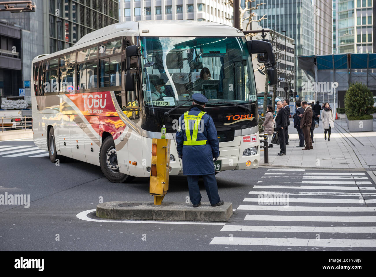 Bus in Marunouchi commercial dsitrict of Chiyoda special ward, Tokyo city, Japan Stock Photo