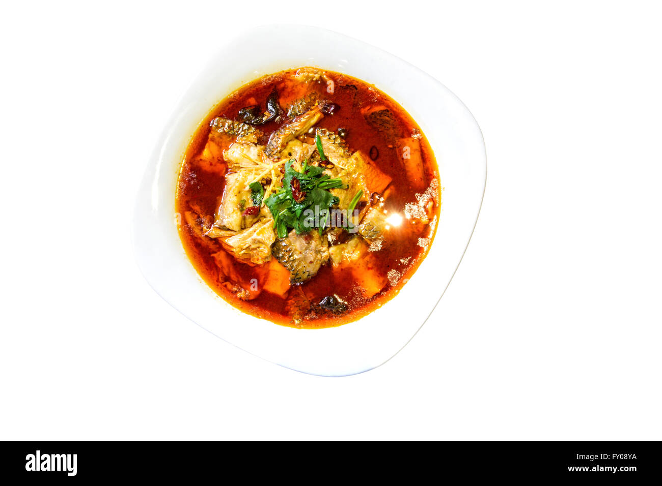 chinese fish splinters broth ion white background Stock Photo - Alamy
