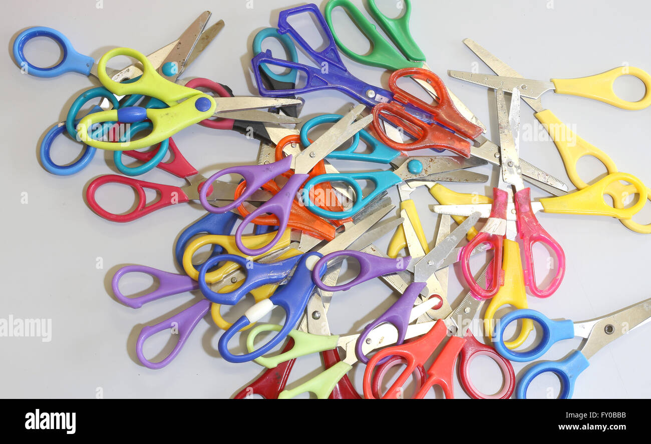 series of many children's scissors to do school works at kindergarten