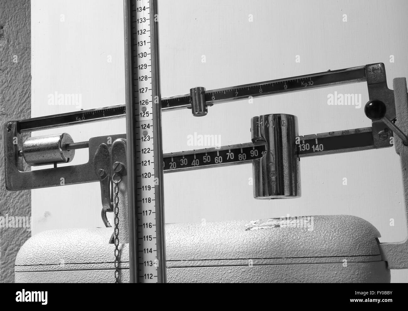 old scales in the doctor's clinic to measure weight and height Stock Photo