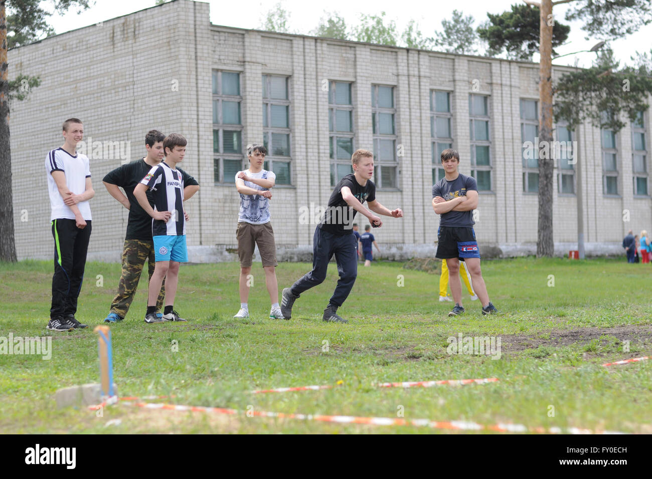 Military sports game Zarnitsa. Throwing grenades Stock Photo Alamy