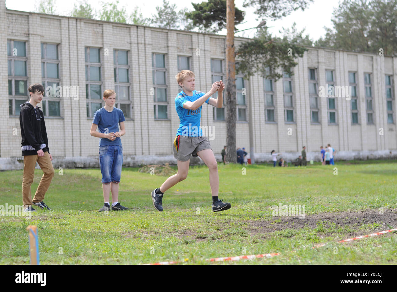 Military sports game Zarnitsa. Throwing grenades Stock Photo Alamy