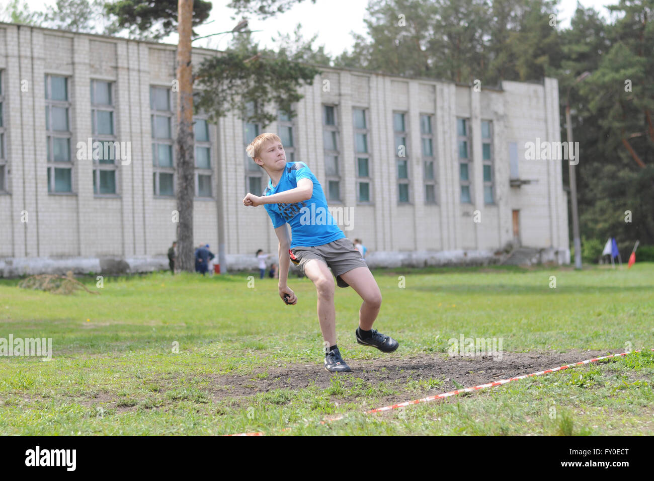 Military sports game Zarnitsa. Throwing grenades Stock Photo Alamy