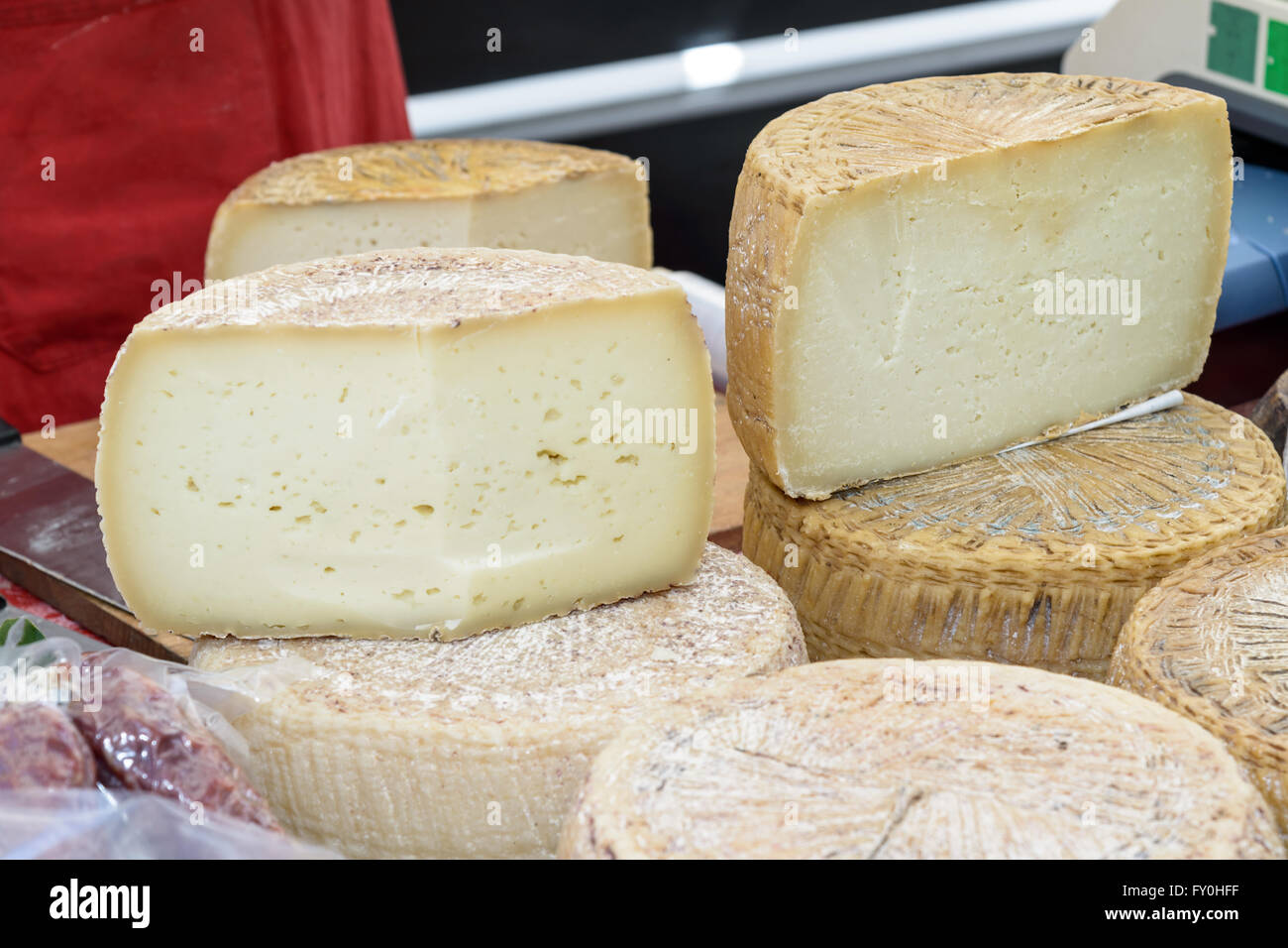 Pecorino cheese typical processing of Sardinia exposed for sale. Stock Photo