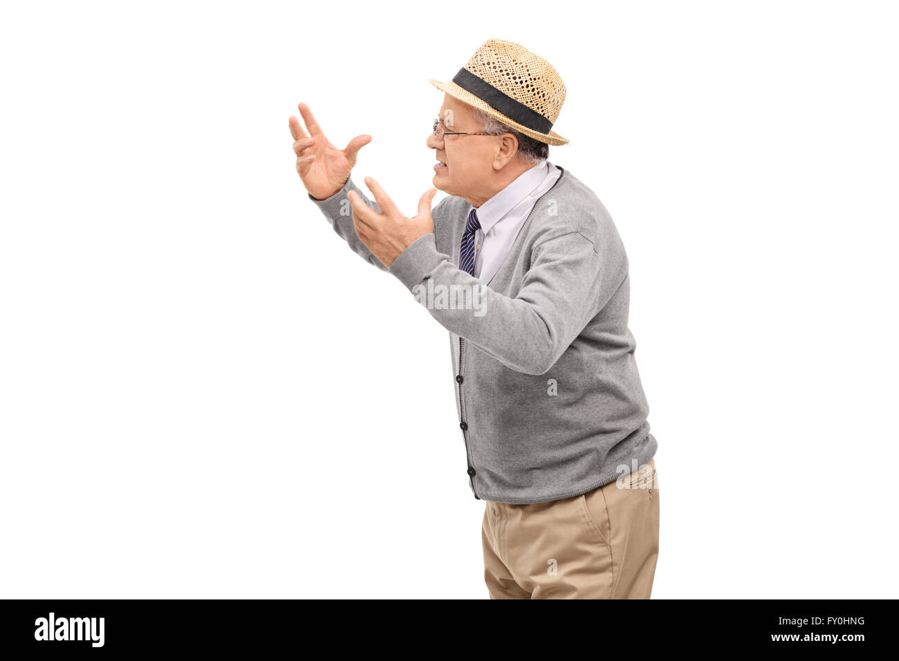 Studio shot of a displeased senior man arguing with someone isolated on white background Stock Photo