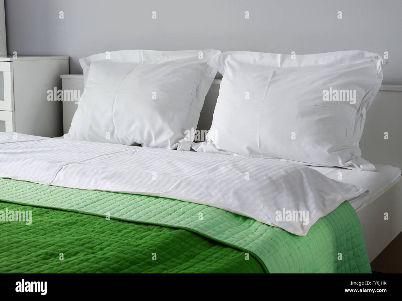 Double bed in hotel room. Stock Photo Alamy