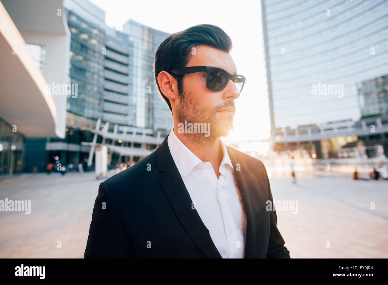 Half Length Of Young Handsome Black Hair Modern Businessman Posing