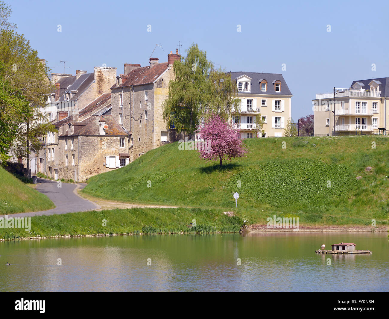 Town and pond of Falaise, a commune in the Calvados department in the Basse-Normandie region in northwestern France Stock Photo