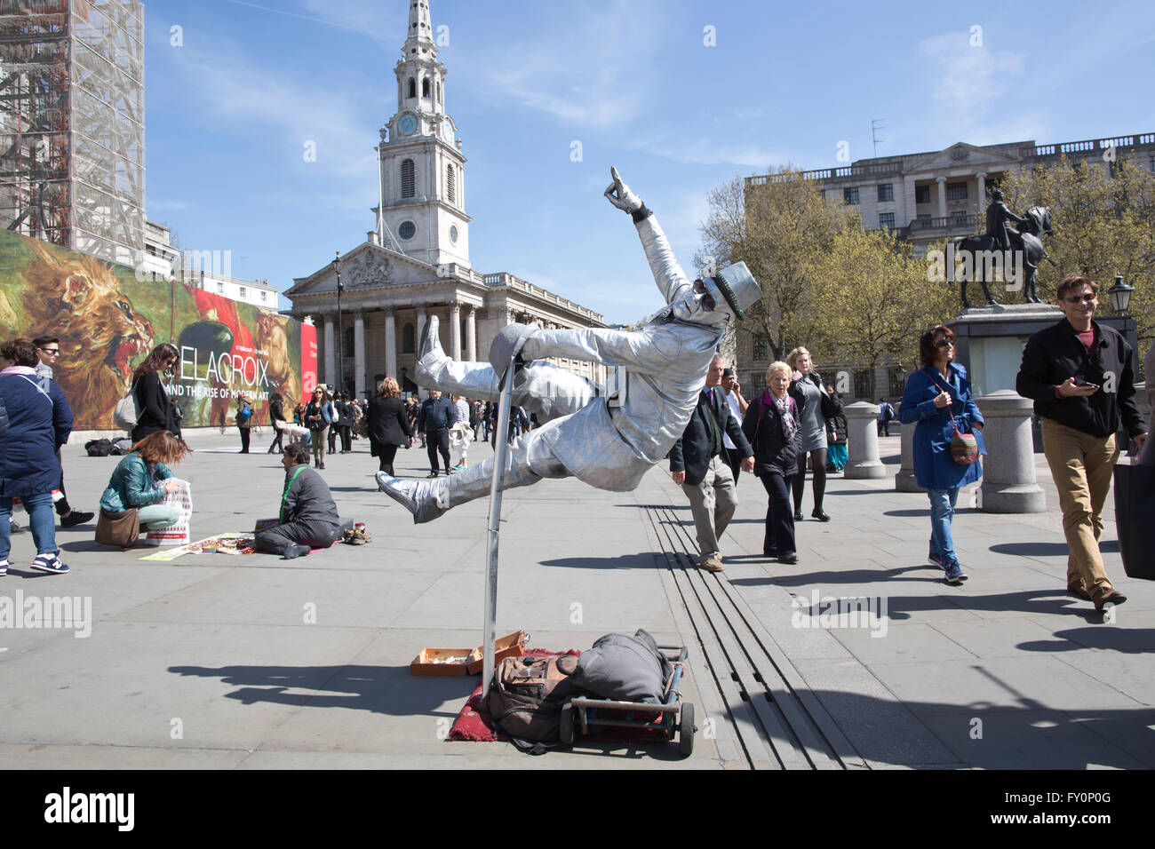 Levitating street entertainer in Trafalgar Square, central London, UK Stock Photo