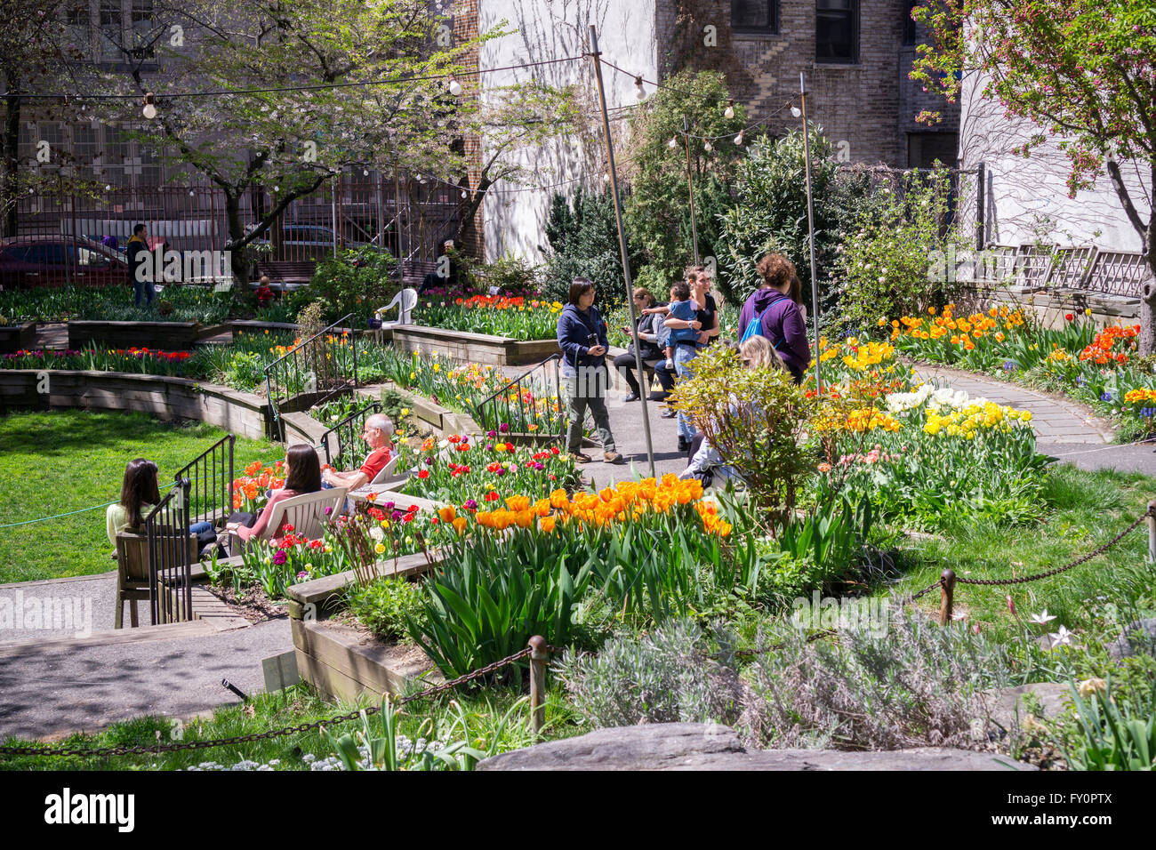visitors to the west side community garden in new york enjoy the