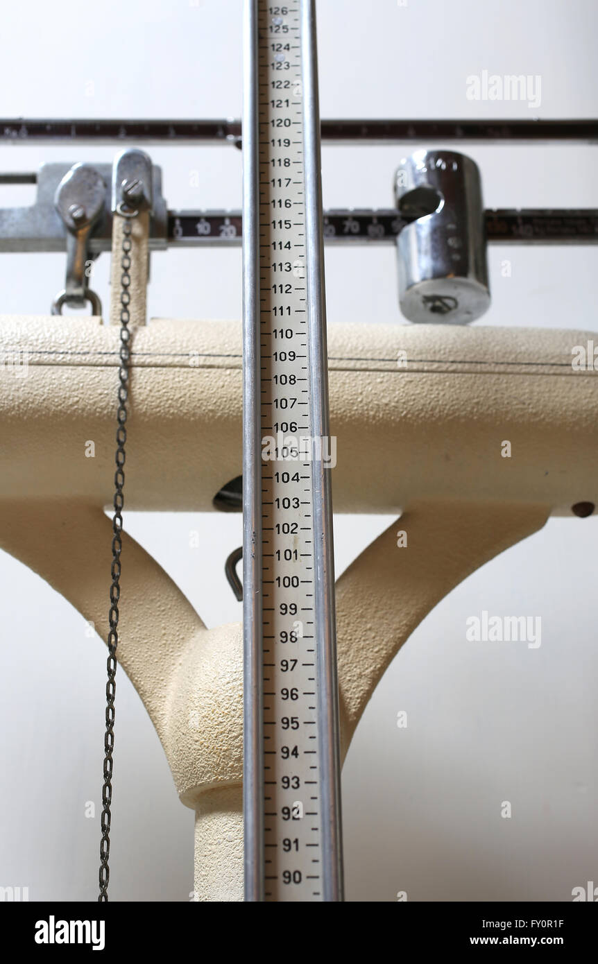 old scales to measure weight and height of children with obesity Stock Photo