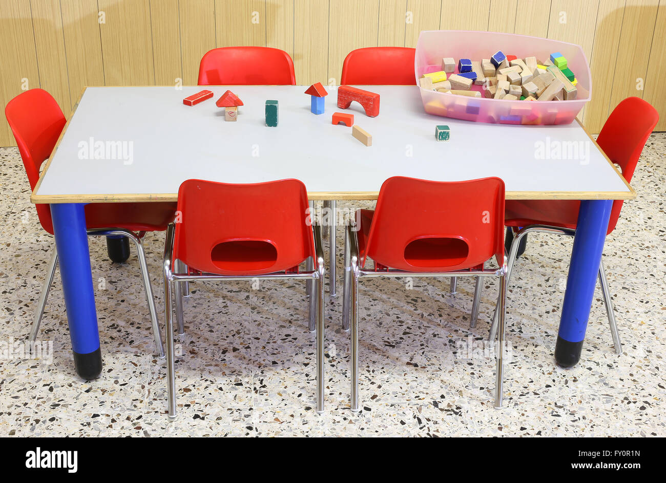 Nursery classroom with wooden toys on the table Stock Photo Alamy
