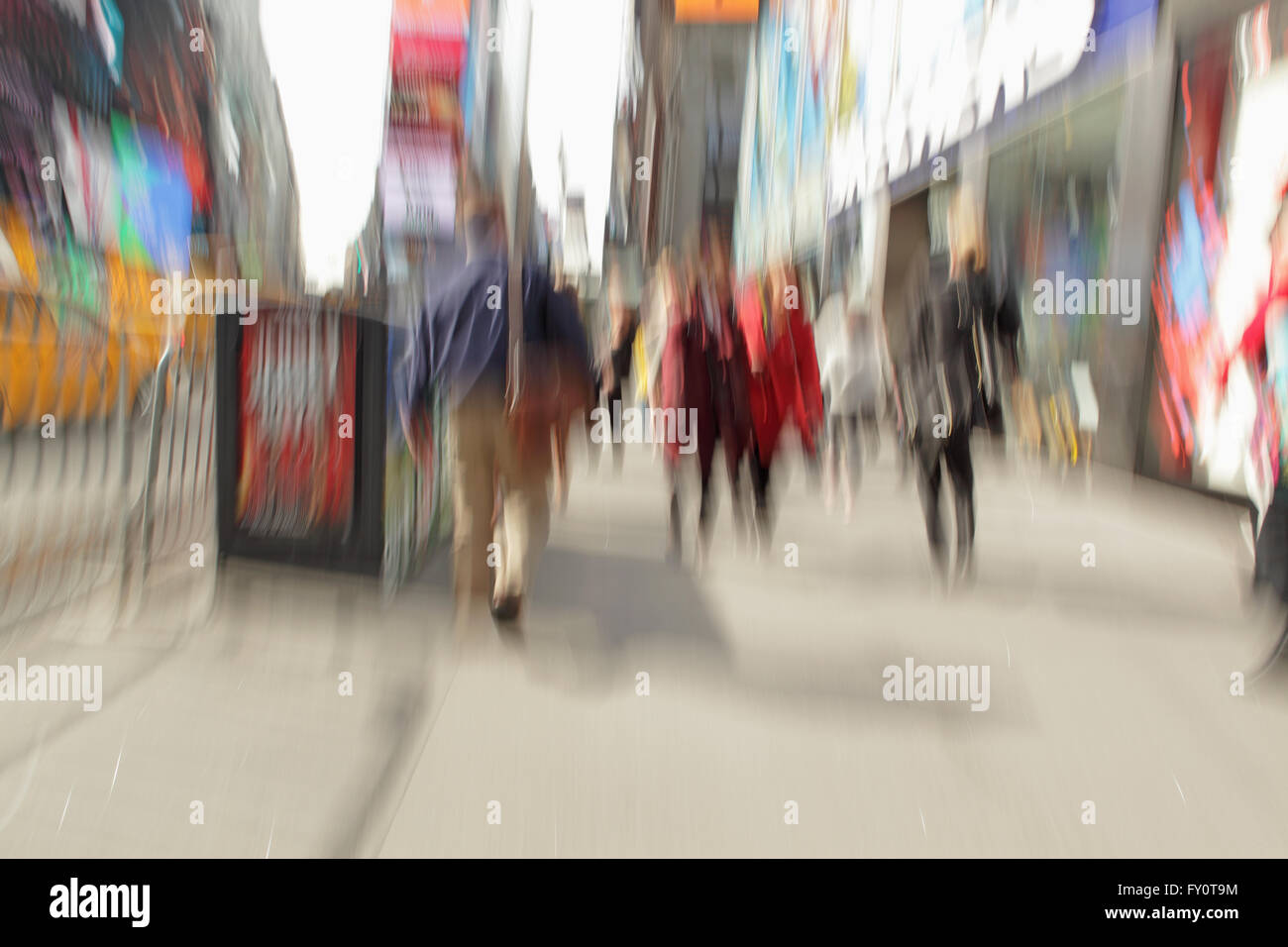 Blurred Long Exposure Of People Walking Along 7th Avenue In Times Stock