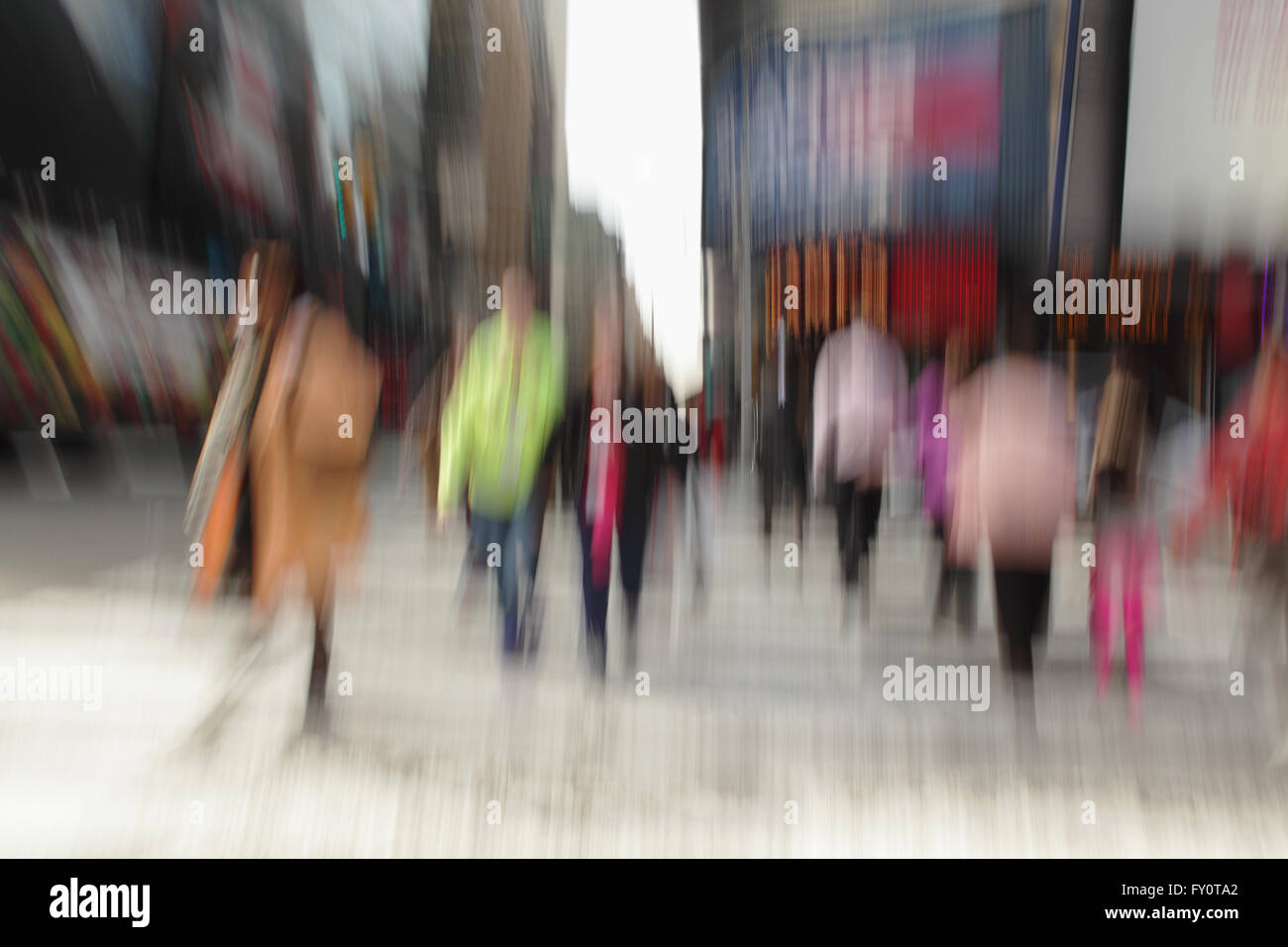 Blurred long exposure of people walking along 7th Avenue in Times Square.  New York City Morning Series Stock Photo