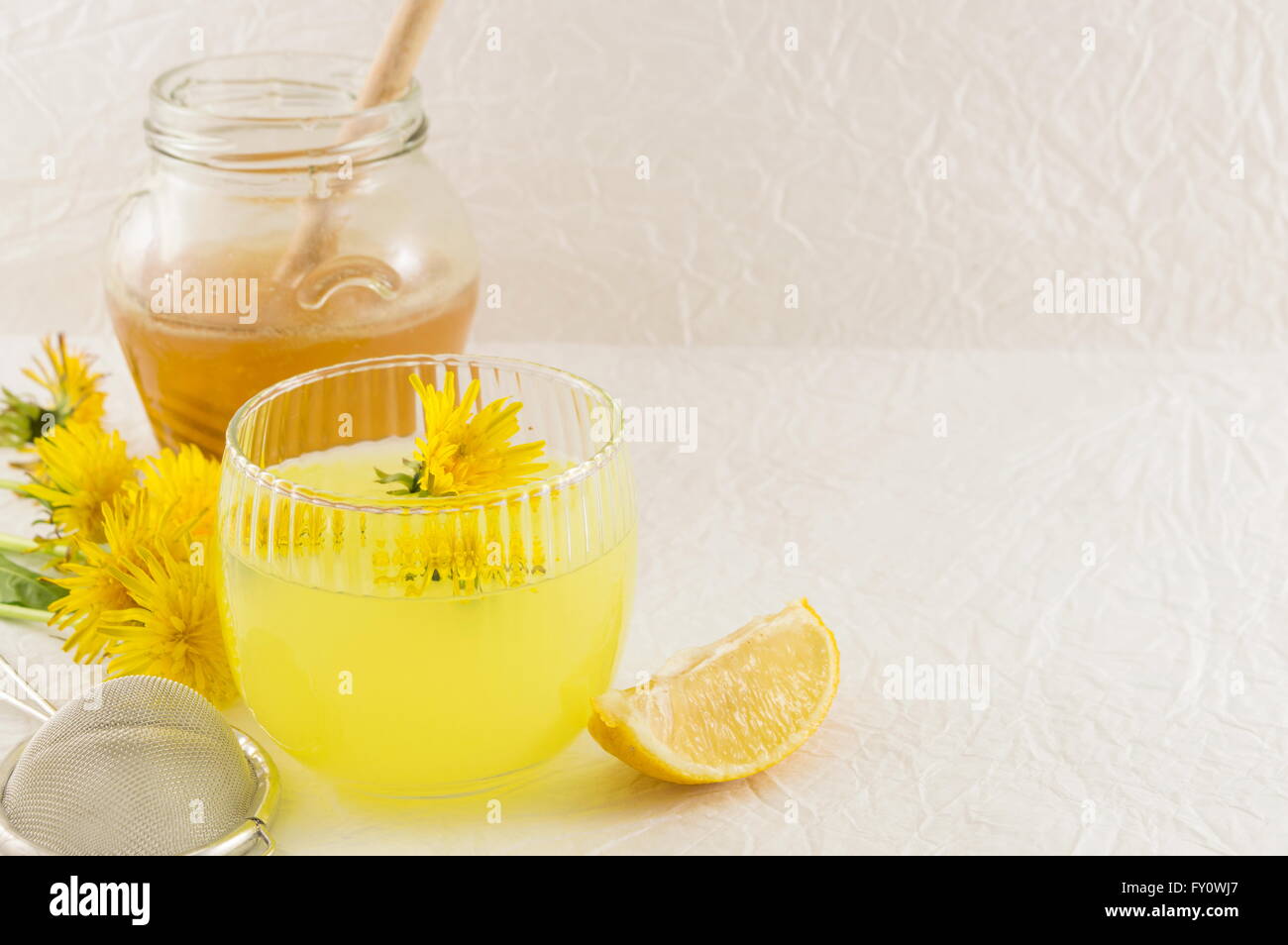 Dandelion tree with fresh dandelion flowers Stock Photo - Alamy