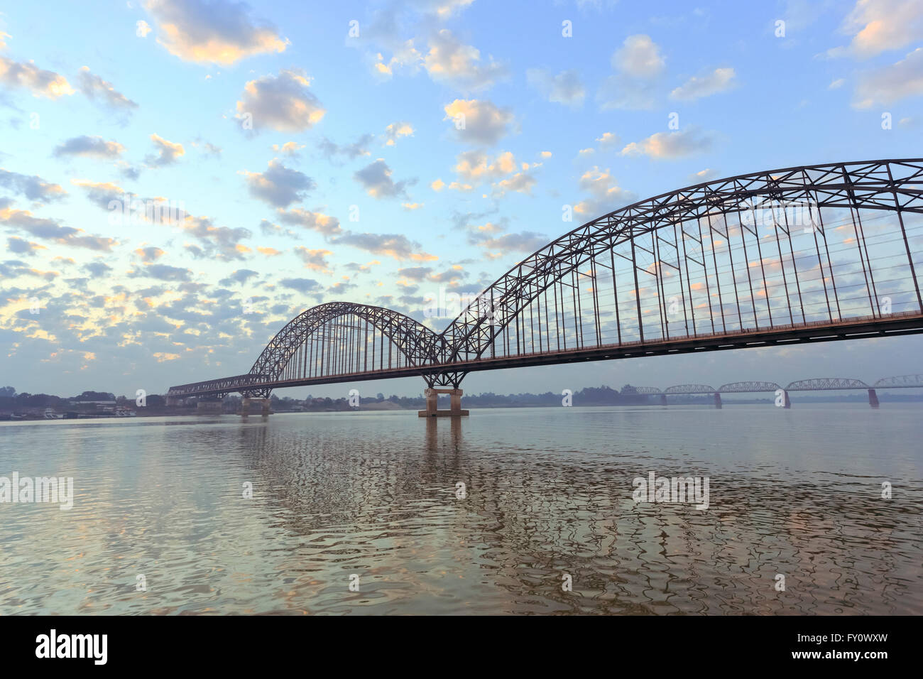 Irrawaddy (or Yadanabon) Bridge over the Irrawaddy River, Sagaing, near Mandalay, Myanmar (Burma) on a misty, foggy morning Stock Photo
