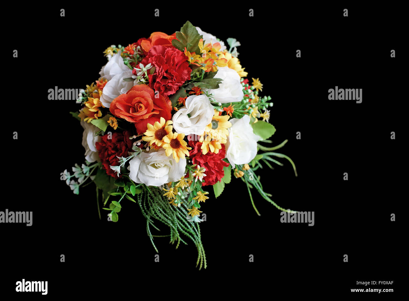 colorful artificial flower isolated on black background Stock Photo