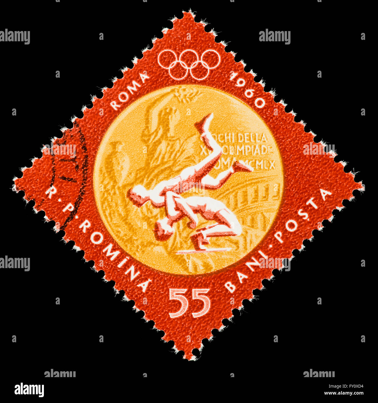 Postage stamp from Romania depicting wrestling and gold medal from the 1960 Rome Summer Olympic Games. Stock Photo