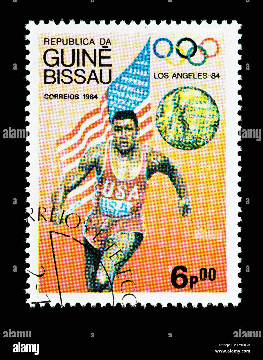 Postage stamp from the United States depicting Carl Lewis, 4x100 meter relay, 1984 Summer Olympic Games in Los Angeles. Stock Photo