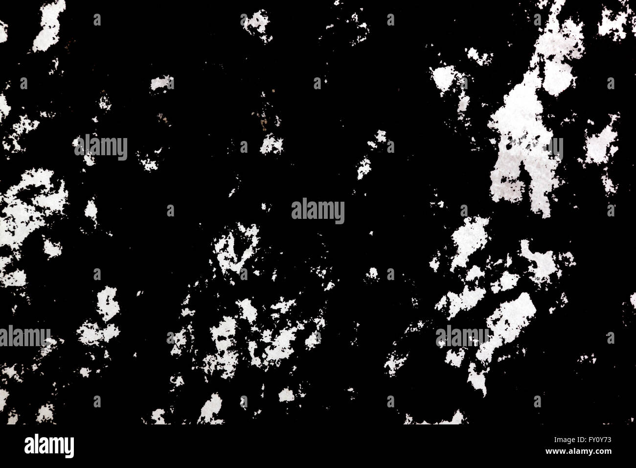 Closeup abstract background of black and white patches and blotches