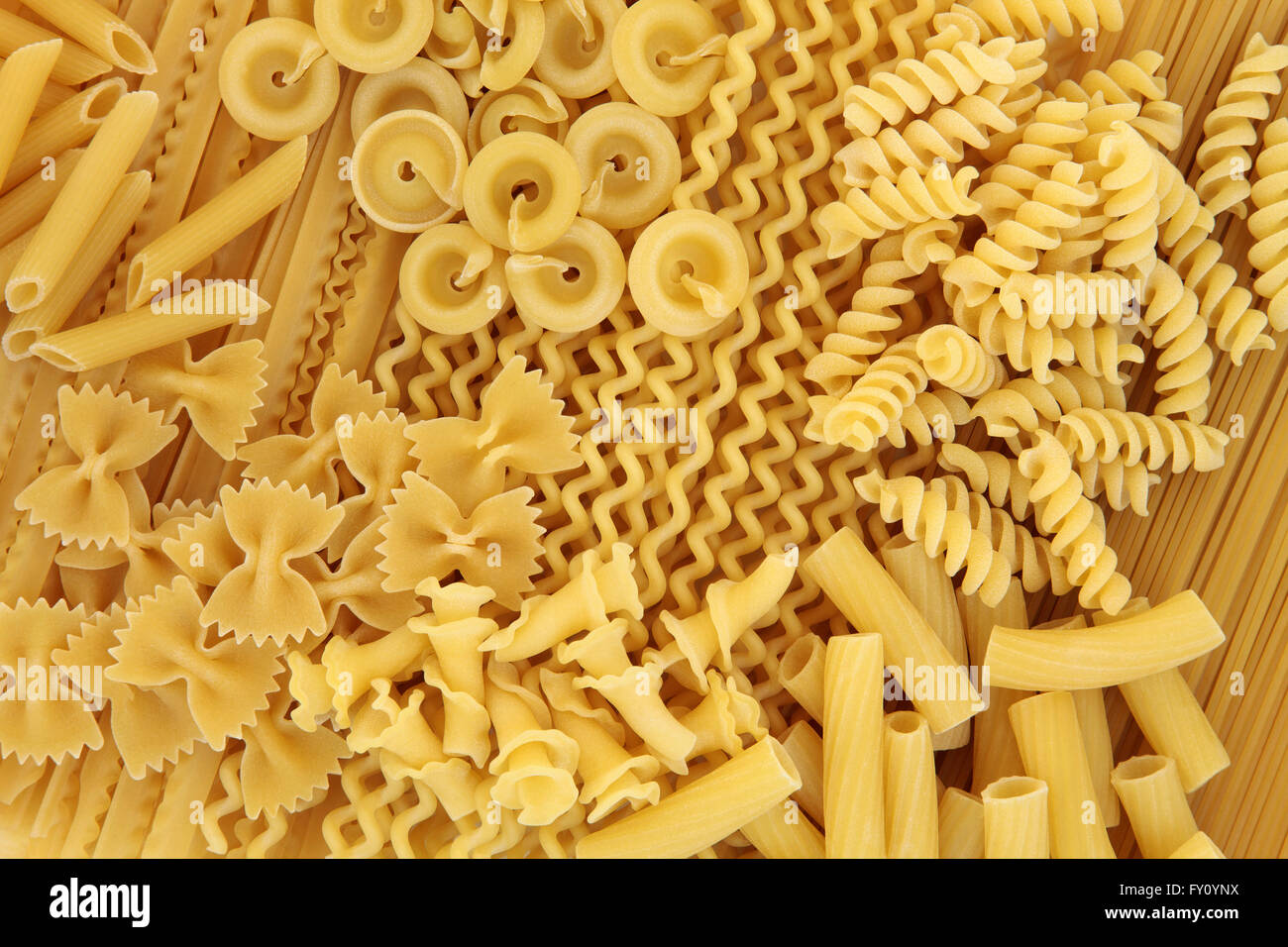 Large pasta food selection forming an abstract background. Stock Photo