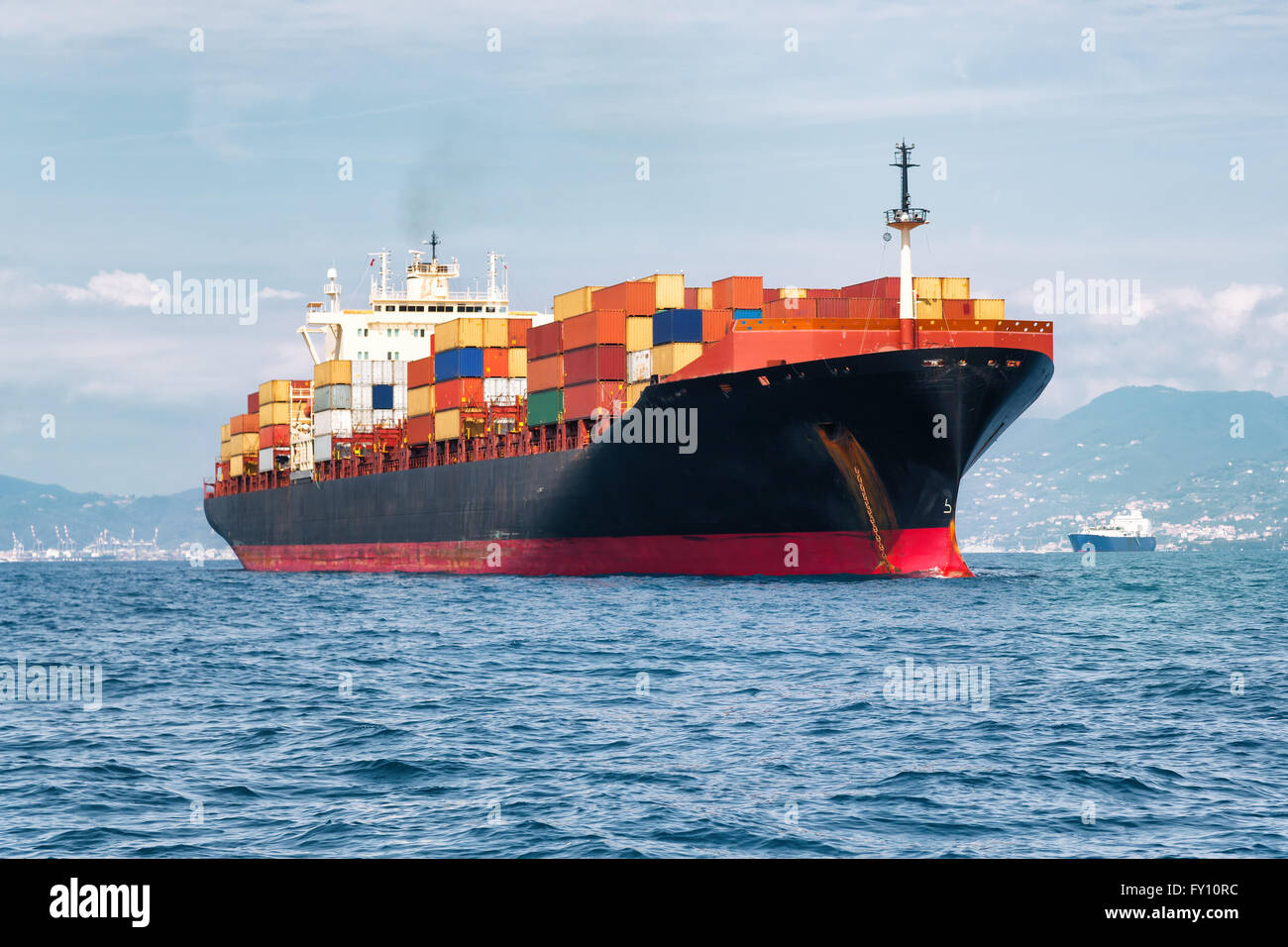 commercial cargo ship carrying containers Stock Photo Alamy