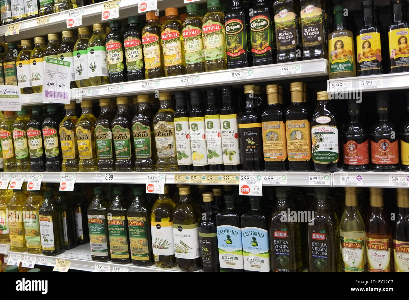 Well stocked shelves of olive oils in a supermarket in Florida, April 2016 Stock Photo