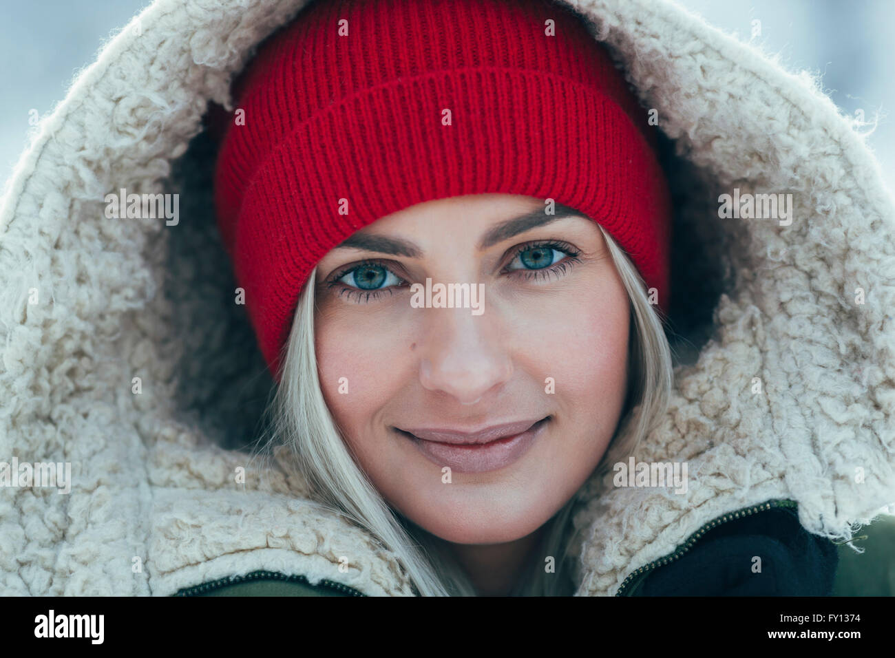 Closeup portrait of beautiful young woman wearing hood Stock Photo Alamy