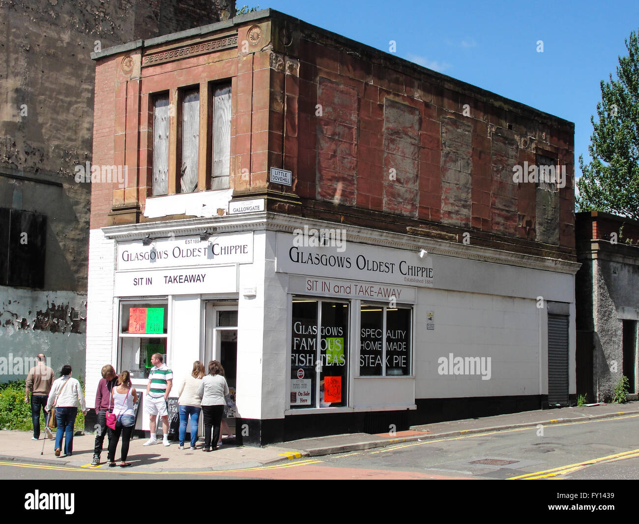 The Glasgow Oldest Chippie, a popular take away fish and chips shop in Glasgow city center with customers waiting outside Stock Photo