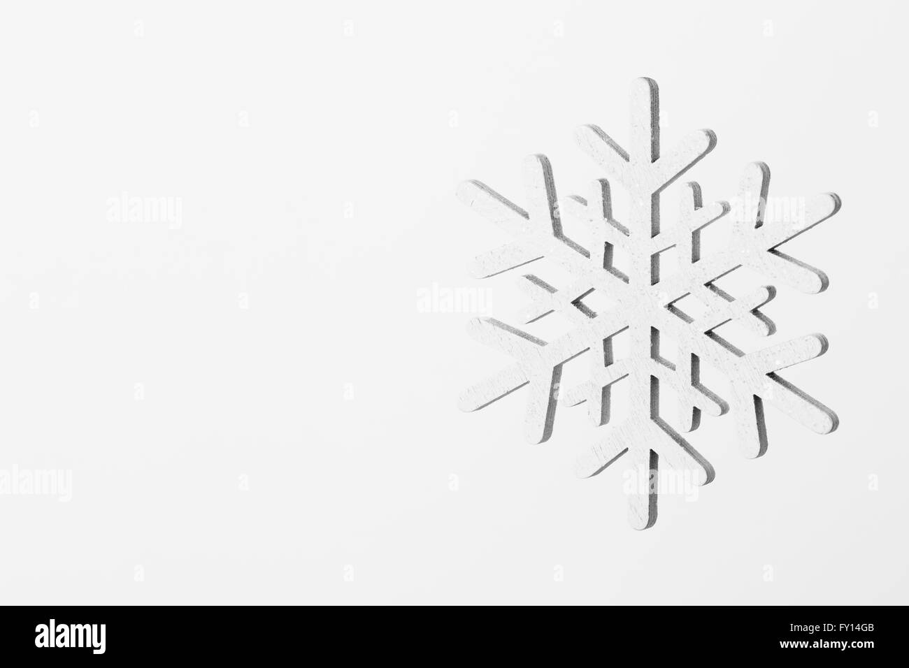 Close-up of snowflake on white background Stock Photo - Alamy